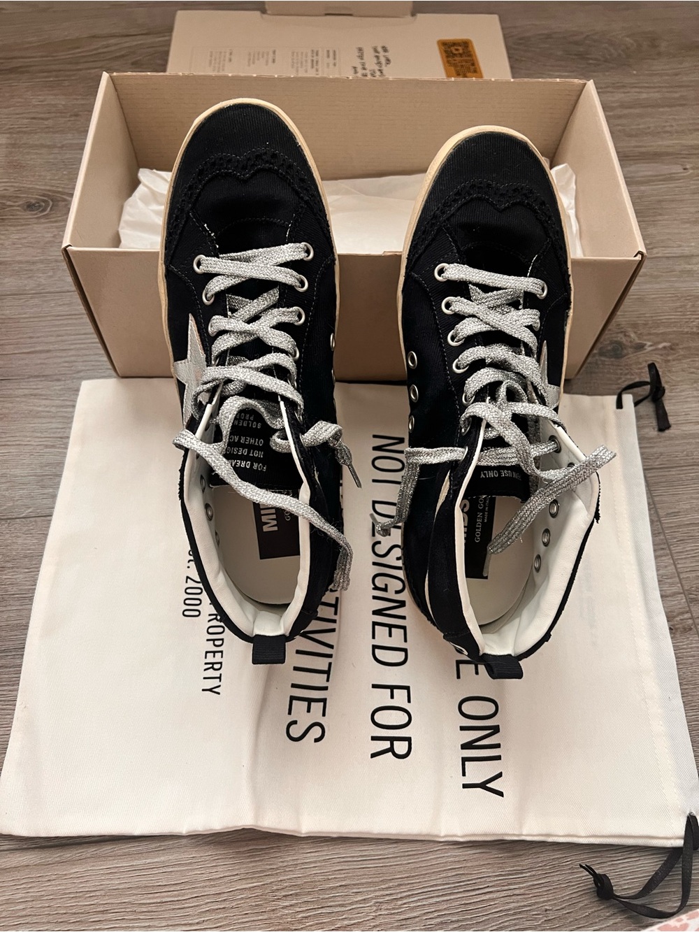Golden Goose Black and White Midstar Low-Top Sneakers